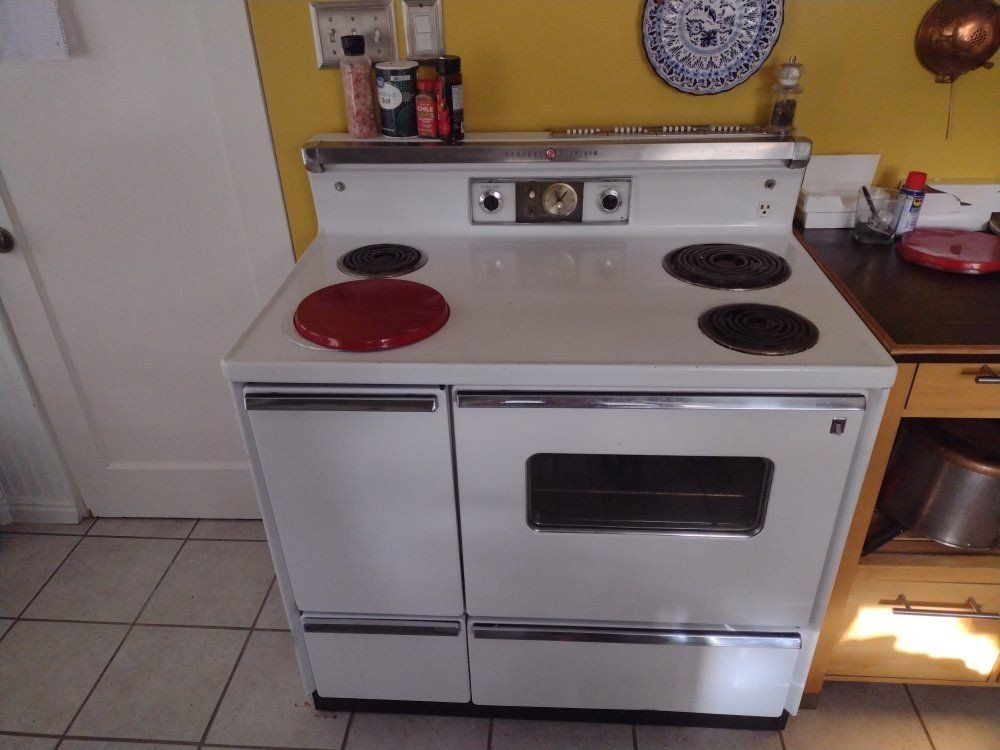 Vintage GE Electric Range Stove Oven, White,, 2 Burners still work great and oven works great  You haul.