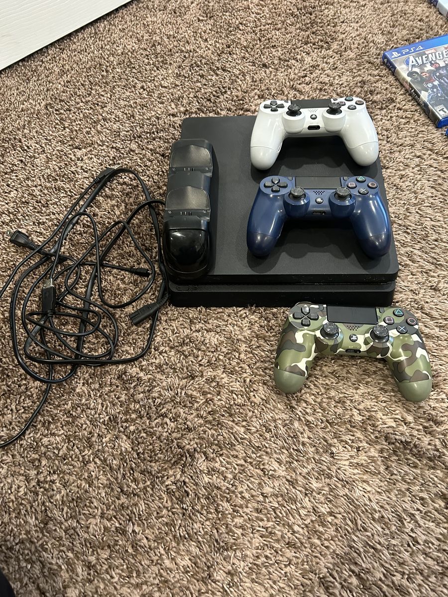 PS4 Consile With Cables, Charger And 3 Controllers