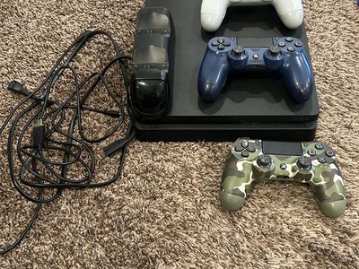 PS4 Consile With Cables, Charger And 3 Controllers