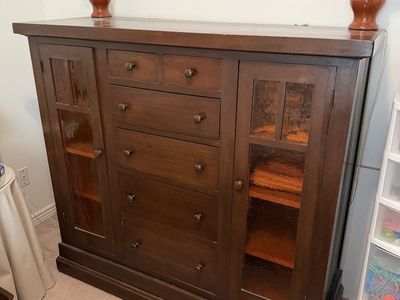 Large Wooden Storage Cabinet with Glass Doors and Drawers