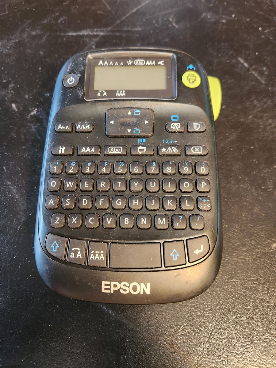 Epson Label maker with a full roll of labels.  Works great (batteries not included.)