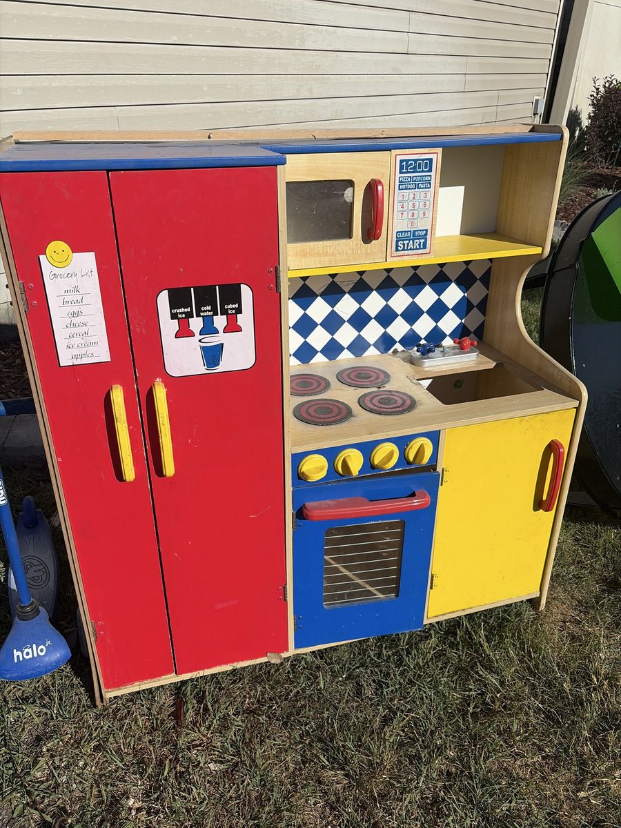 Free!! Used! KidKraft Wooden Play Kitchen with Refrigerator, Stove, Oven & Microwave - Colorful Pretend Play Set
