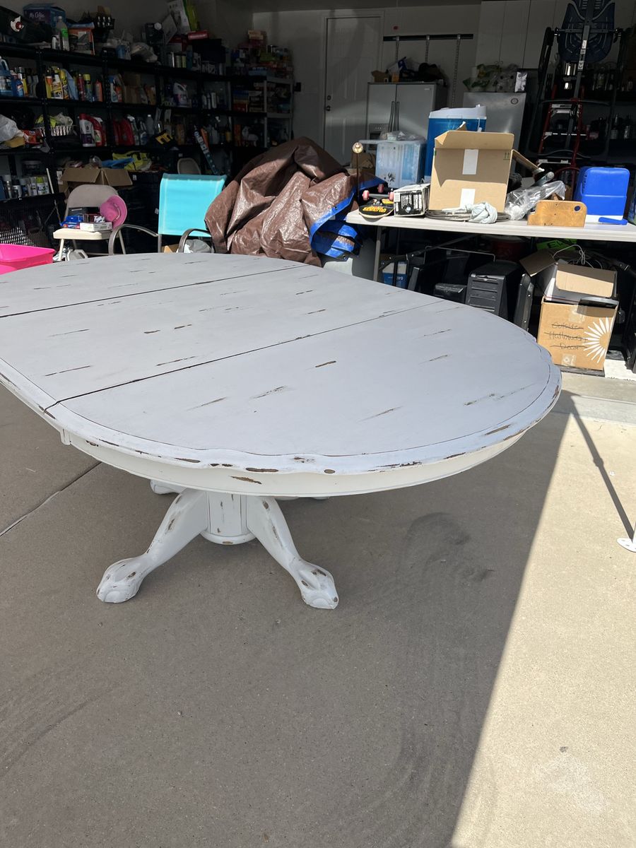 Distressed White Pedestal Dining Table - Oval with Leaf Inserts