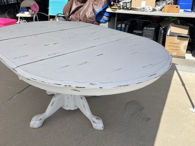 Distressed White Pedestal Dining Table - Oval with Leaf Inserts