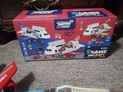 Toy airplane with lights sounds fire trucks helicopter and signs