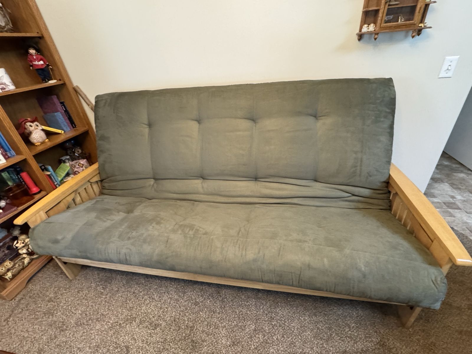 Wooden Futon Sofa with Olive Green Tufted Cushion and Fold-Down Armrests