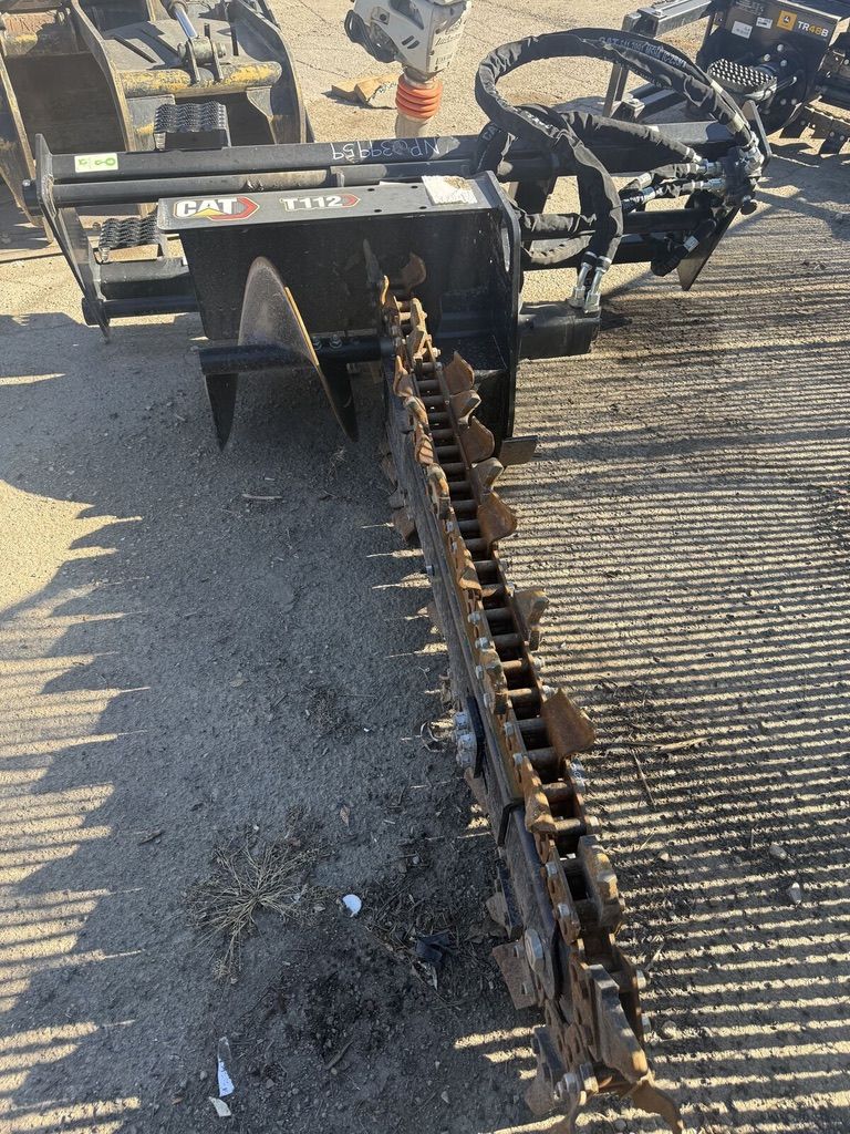 Skid Steer Trencher Attachment Rental – Fast Trenching for Utilities, Sprinklers & Drainage