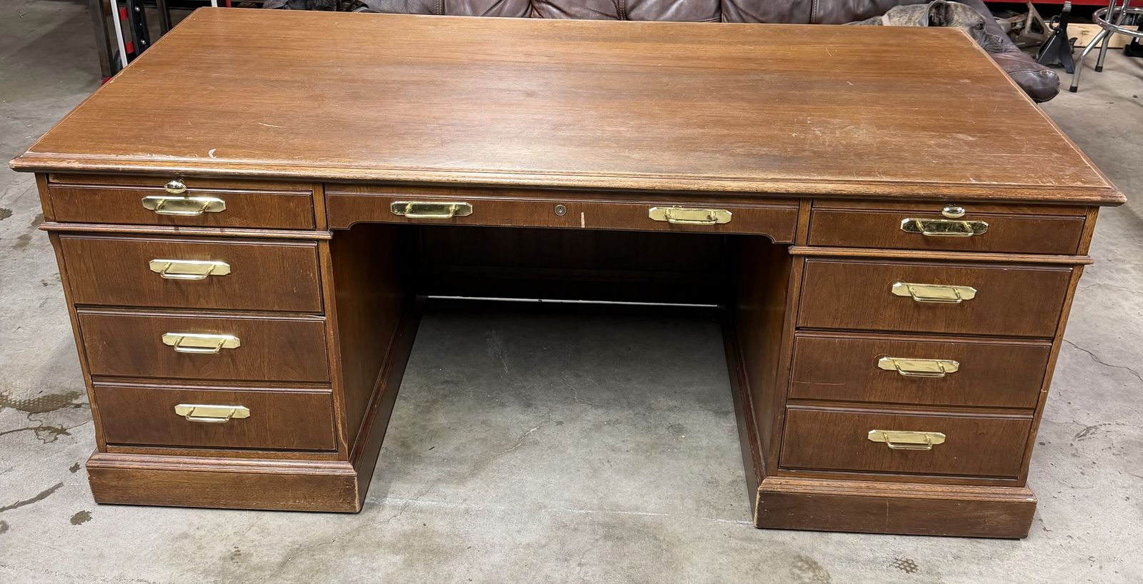 Large Wooden Executive Office Desk with Multiple Drawers and Brass Hardware
