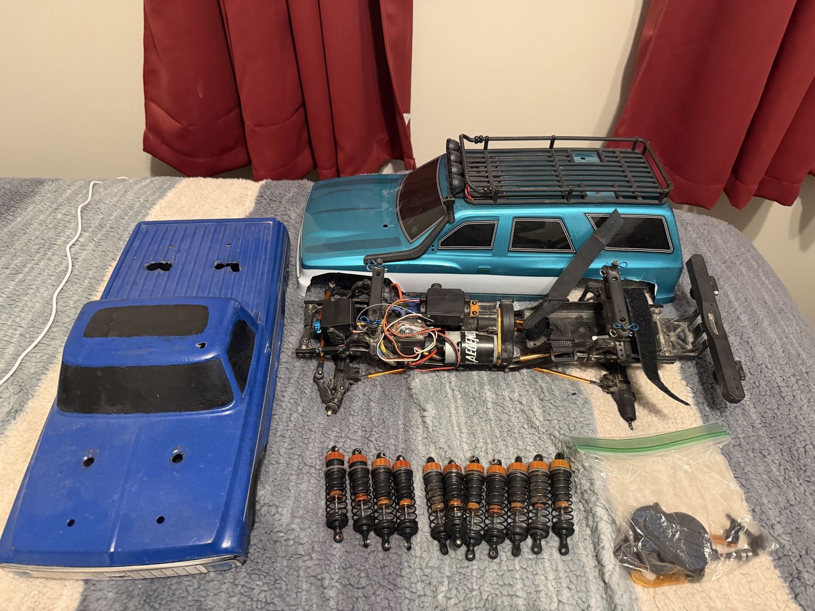 RC Crawler Lot: Blue Chevrolet Body, Teal SUV Body, Chassis, Shocks & Parts - Ready for Rebuild
