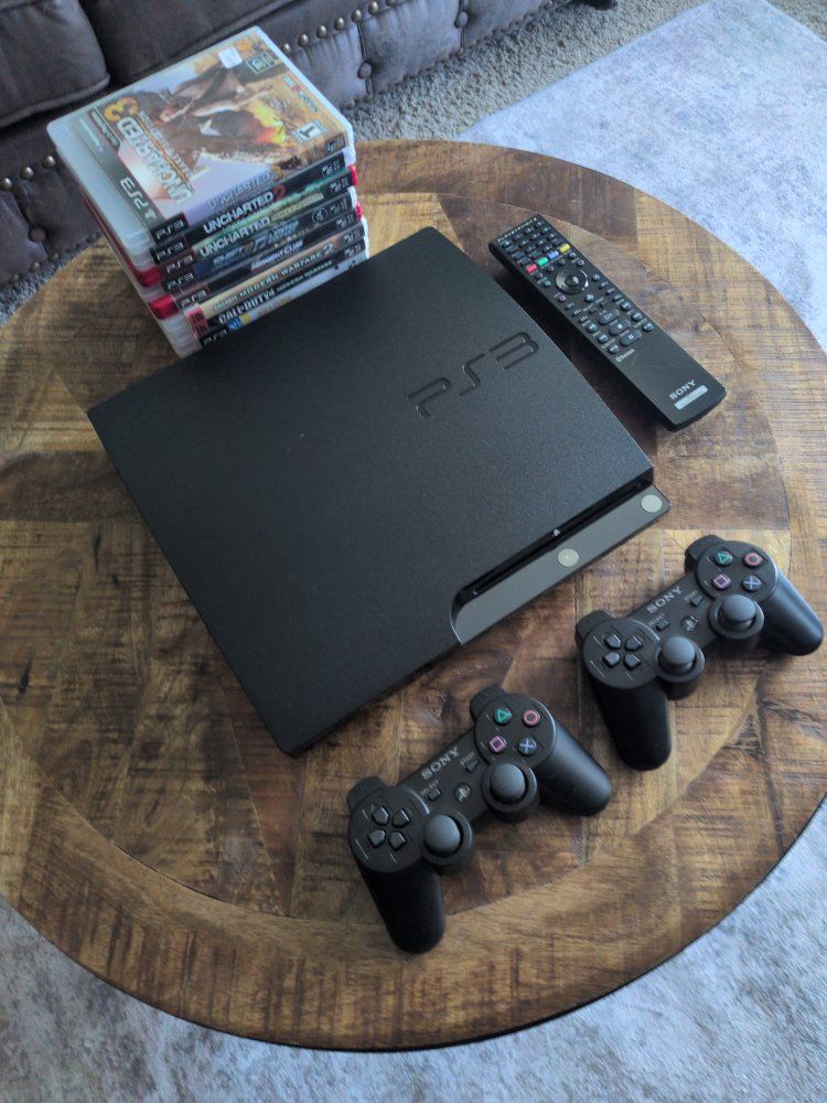 Sony PlayStation 3 PS3 Slim Console Bundle - 2 Controllers & 8 Games (Uncharted, Call of Duty, LittleBigPlanet)