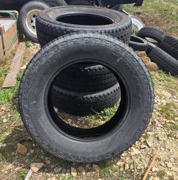 4 Bridgestone Dueler A/T tires only 3k miles used for 20 inch rims