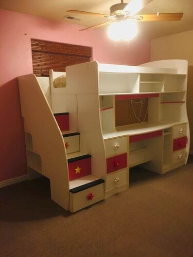 Loft house bed with desk, drawers, and hidden playhouse