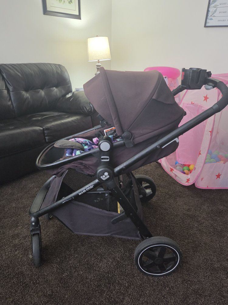 Maxi-Cosi Zelia Stroller - Brown and Black with Floral Infant Insert