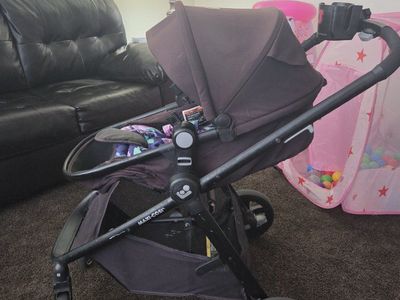 Maxi-Cosi Zelia Stroller - Brown and Black with Floral Infant Insert