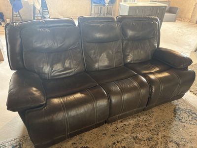 2 dark grey leather couches and matching recliner