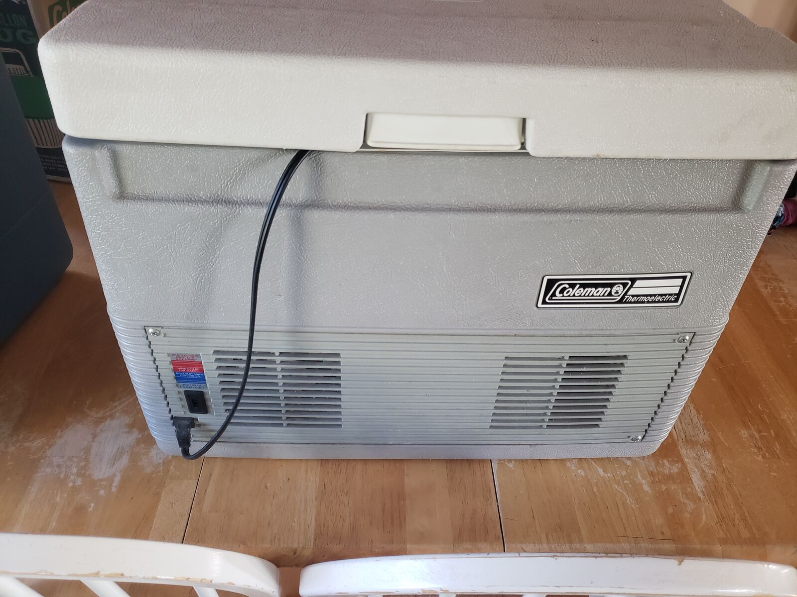 US made gray Coleman 12 volt portable electric cooler with wall power adapter to use at home