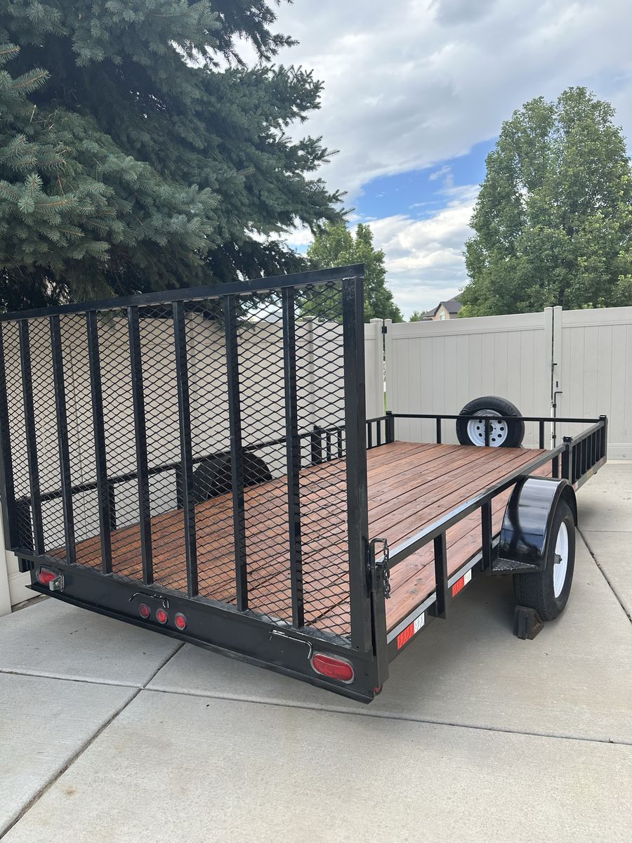 14 x 7 Flatbed Utility Trailer w/ Rear & Side ramps