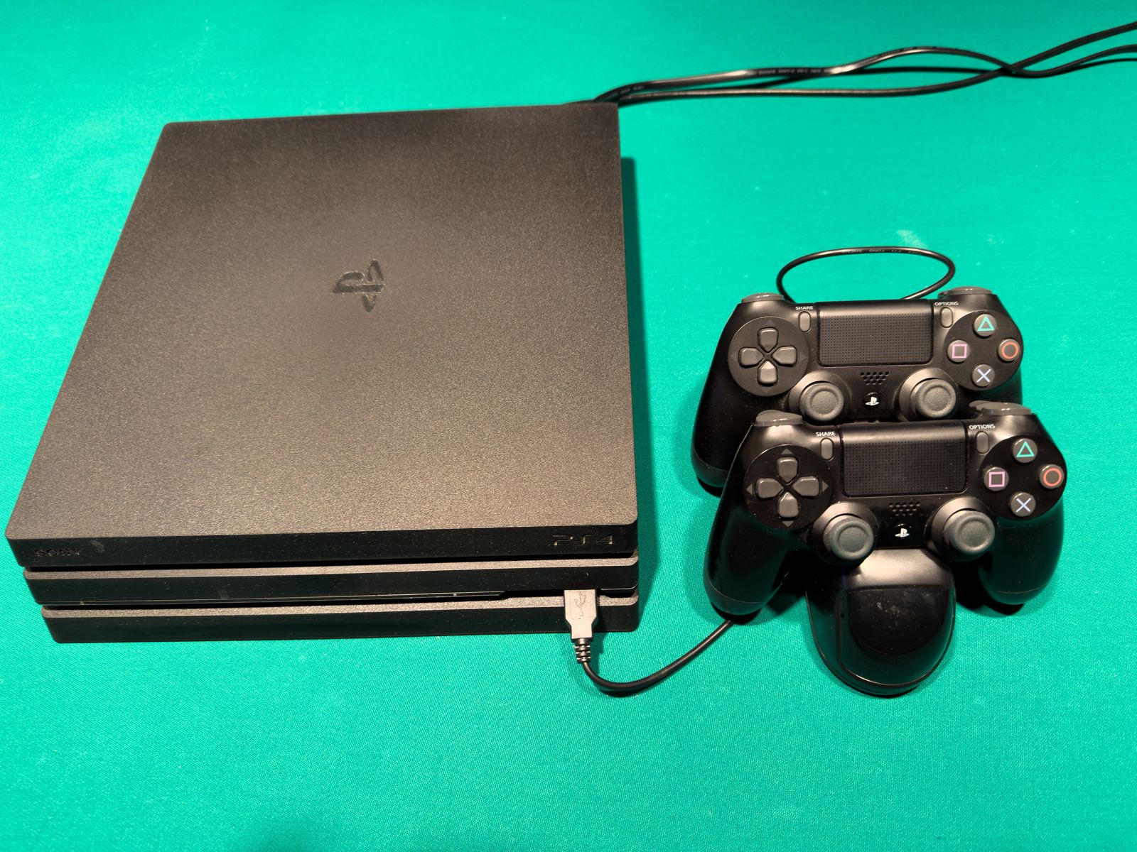 PS4 Pro Console with Dual Charging Dock, Controllers and Game Bundle