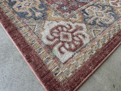 7’10 x 10’2 Area Rug