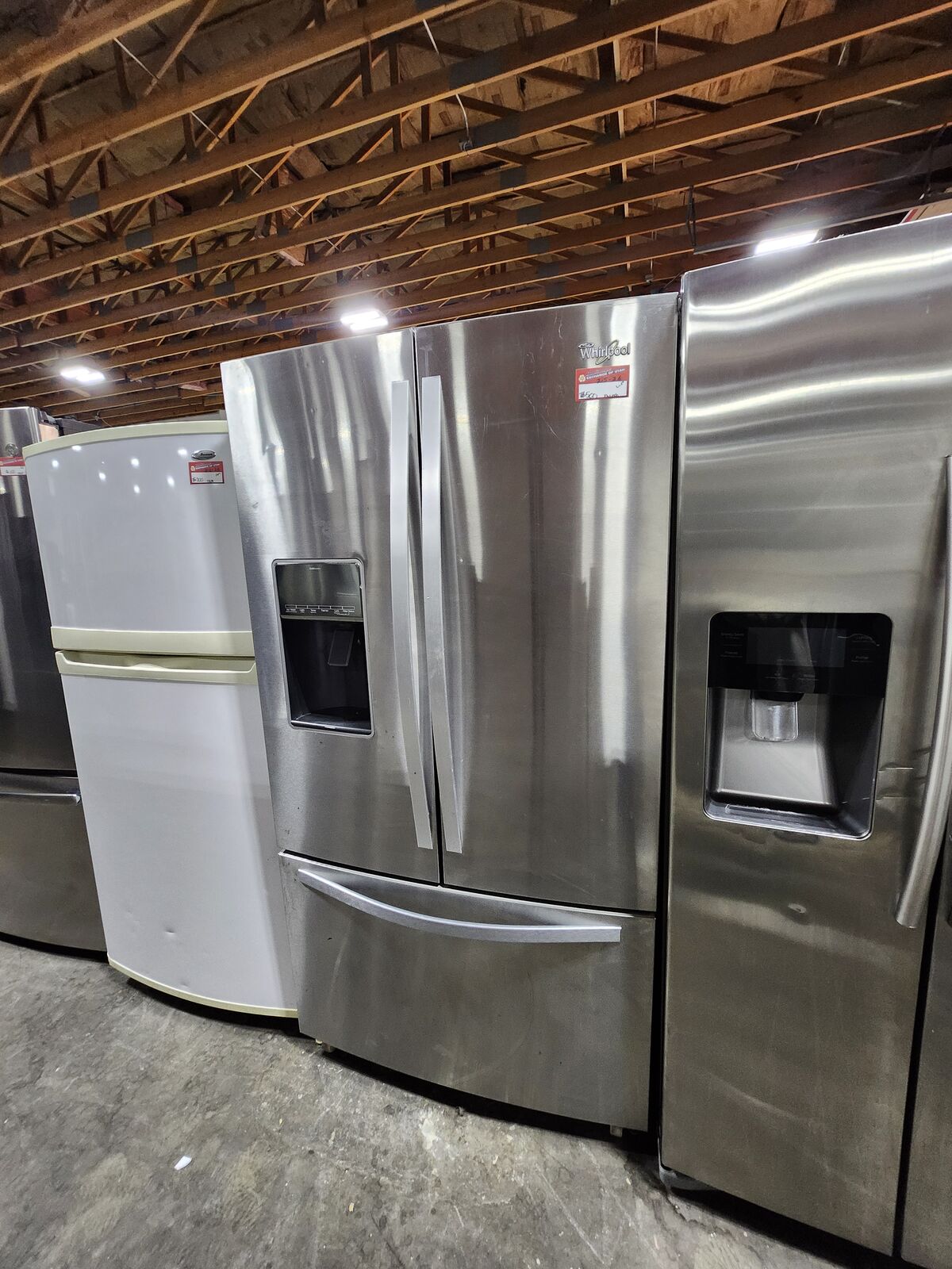 LOW PRICE GUARANTEED! WHIRLPOOL STAINLESS STEEL FRENCHDOOR FRIDGE