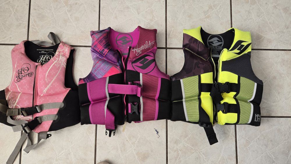 $35 for each life jacket. $30 for the small pink life jacket.  these are about $70 brand new. Only used a couple times. Hyperlit