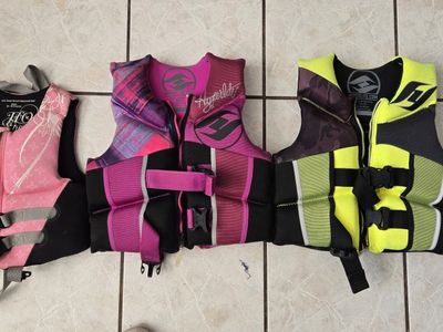 $35 for each life jacket. $30 for the small pink life jacket. these are about $70 brand new. Only used a couple times. Hyperlit