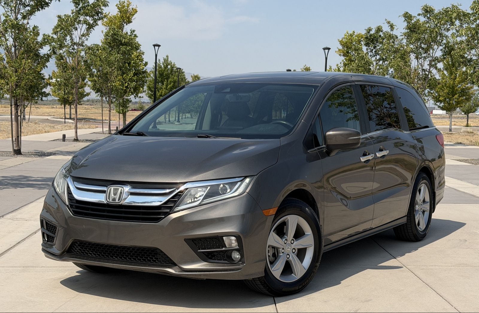 2019 Honda Odyssey EX-L — rebuilt & branded title, 22% below market