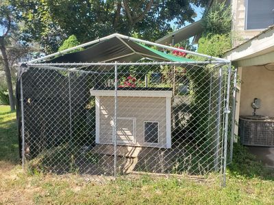 kennel w/ roof and custom insulated house