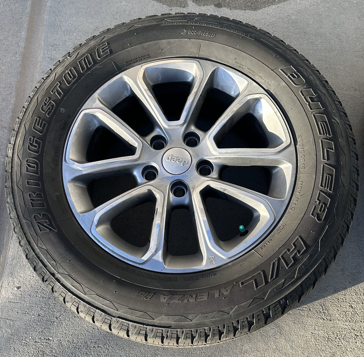 Four, Jeep Grand Cherokee 18” X 8” OEM Wheels with mounted Bridgestone Dueler H/L Alenza Plus Tires