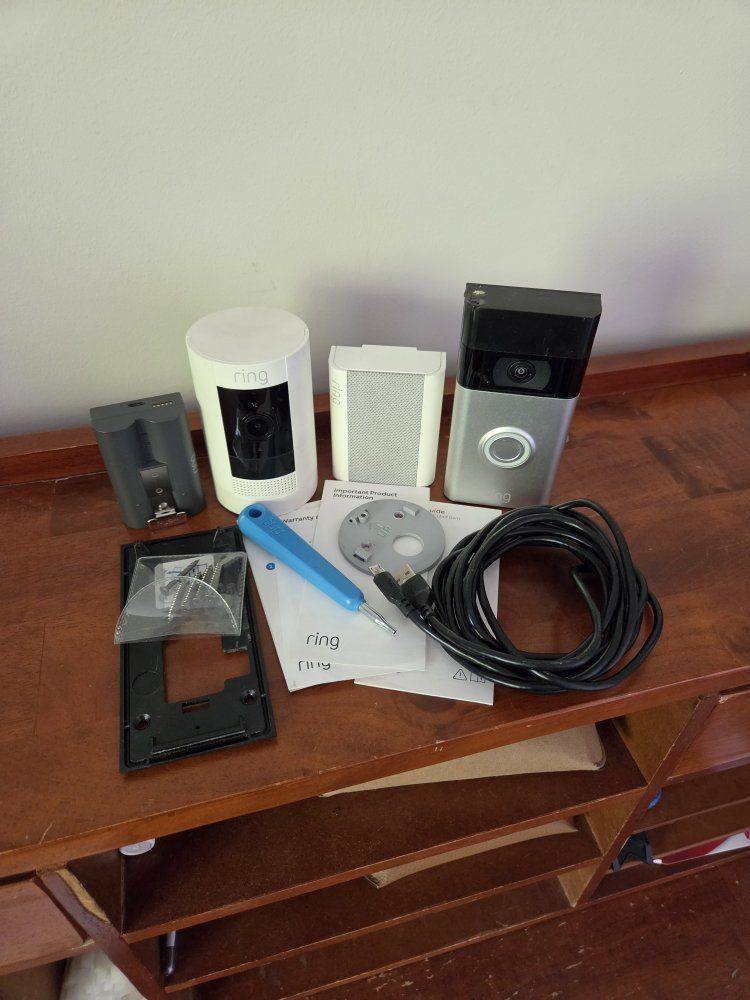 Ring Home Security System: Spotlight Cam, Video Doorbell 2, Chime, Battery, & Accessories, & Extra Battery.