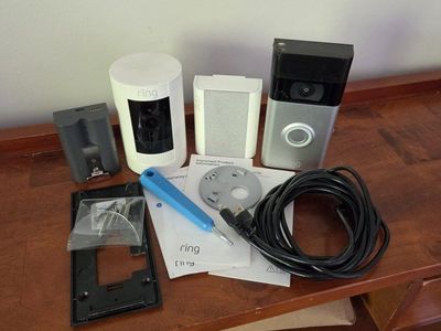 Ring Home Security System: Spotlight Cam, Video Doorbell 2, Chime, Battery, & Accessories, & Extra Battery.