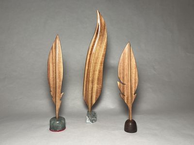 3 handmade cedar wood feathers