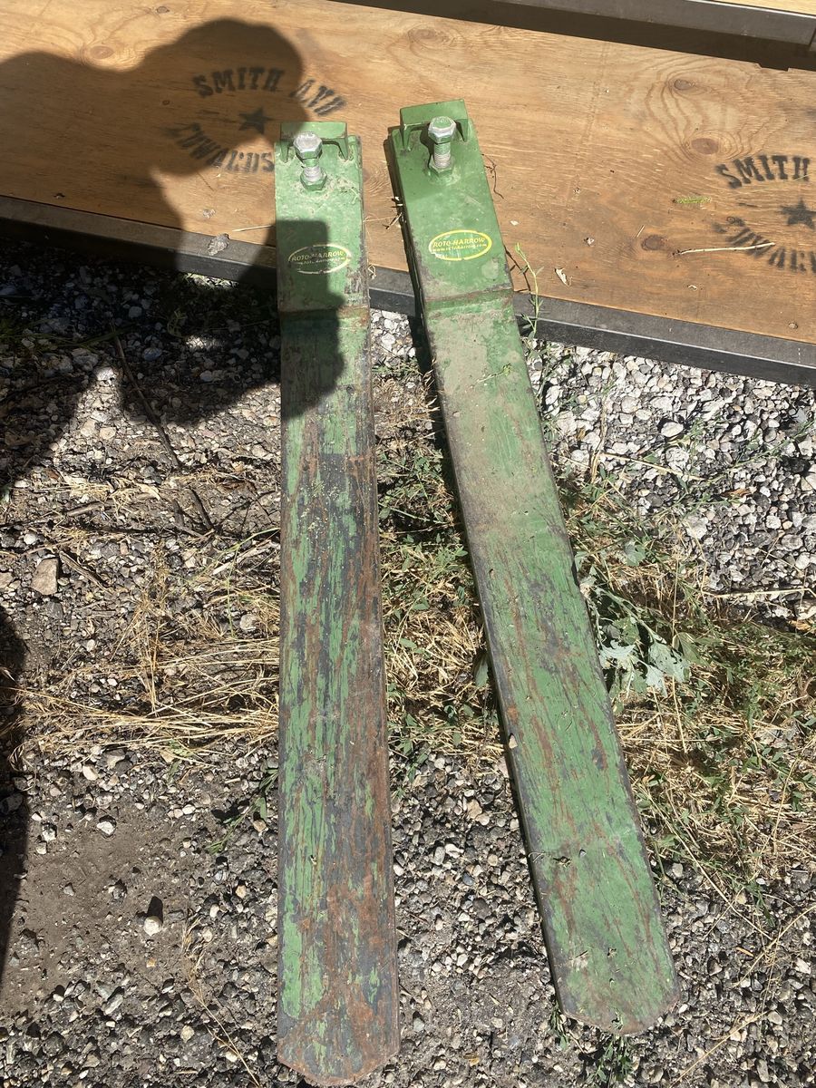 Heavy duty metal forks 3”. X.  4” great for the farm they go on your tractor bucket