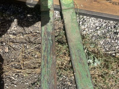 Heavy duty metal forks 3”. X. 4” great for the farm they go on your tractor bucket