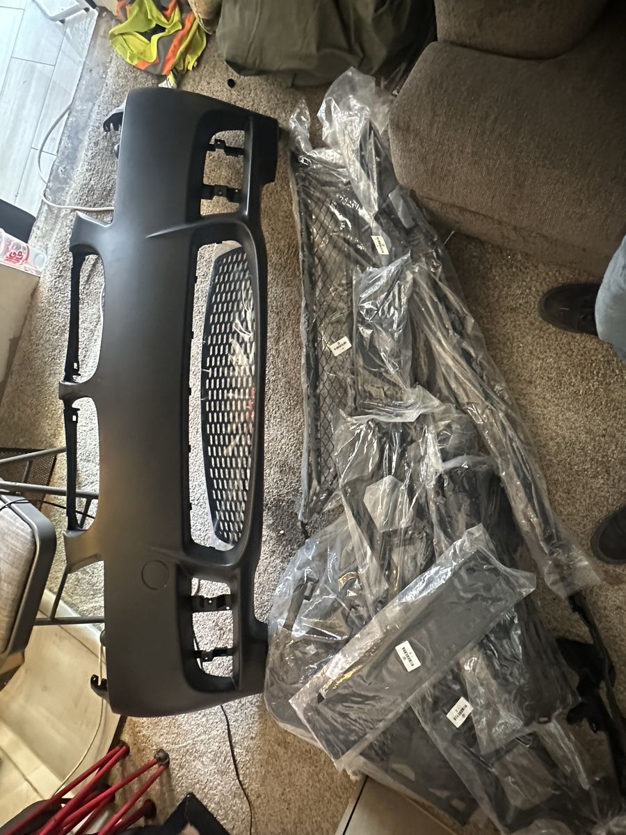 2008 BMW 3series e90 Front Bumper Kit with Grille, Mounting Hardware & more  (Unpainted Black)