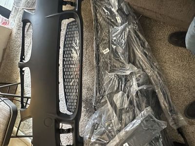 2008 BMW 3series e90 Front Bumper Kit with Grille, Mounting Hardware & more (Unpainted Black)