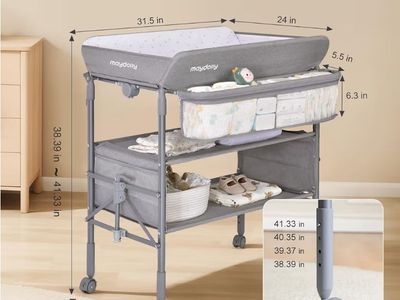 Folding portable changing table