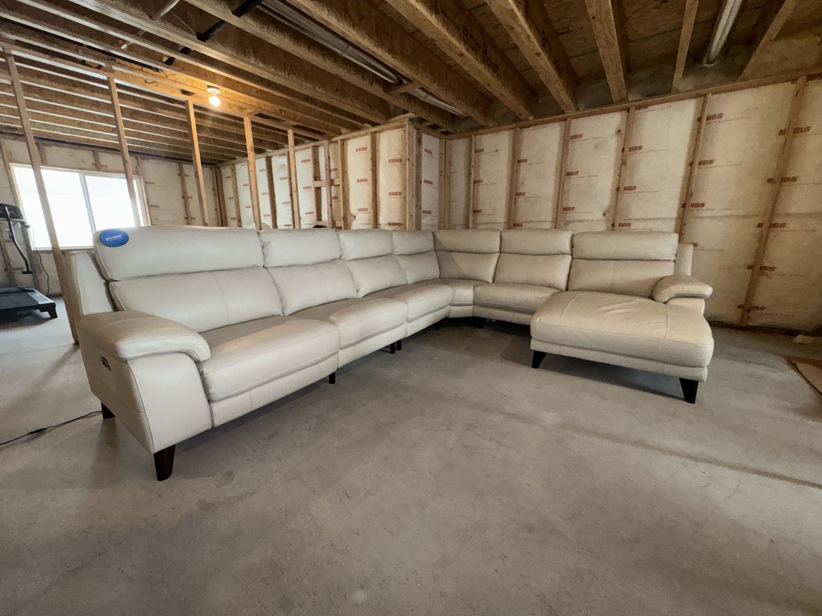 Brand new off white modular leather power reclining sectional with chaise