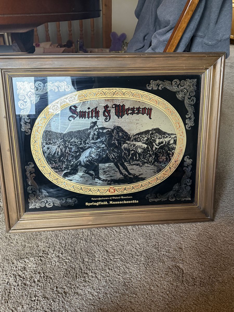 Vintage Smith and Wesson advertising mirror