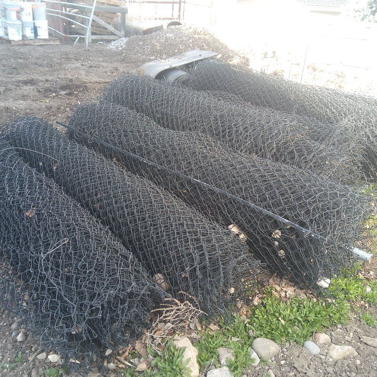 DEER FENCE--$1/3 OFF--USED CHAIN LINK FENCE WITH BLACK VINYL COATING-IN GOOD CONDITION. NEW PRICE AT VINYL INDUSSTRIES, LEHI