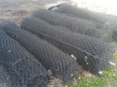 DEER FENCE--$1/3 OFF--USED CHAIN LINK FENCE WITH BLACK VINYL COATING-IN GOOD CONDITION. NEW PRICE AT VINYL INDUSSTRIES, LEHI