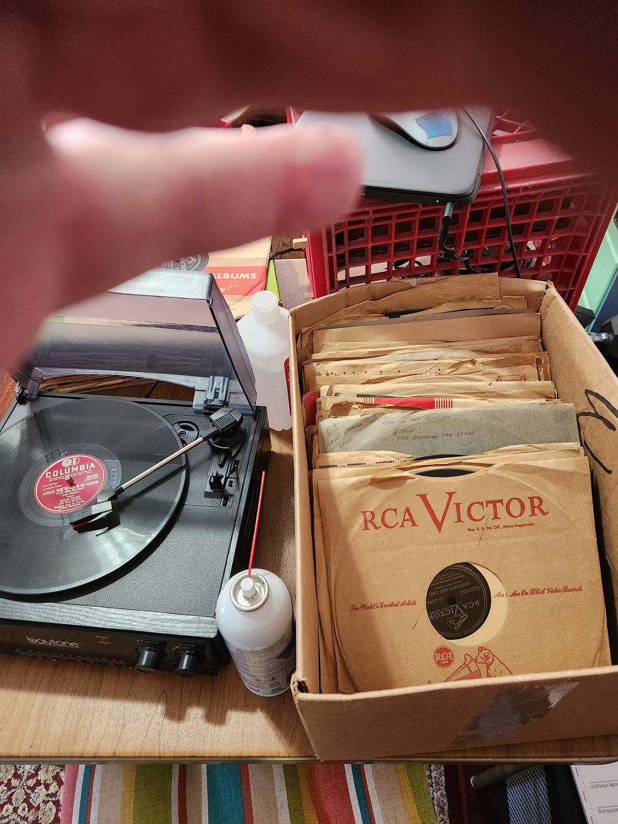 Vintage 78 RPM record albums.  About 60 or so.  Stuff like Glen Miller, Guy Lombardo, and Dinah Shore....all kinds of stuff.