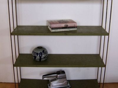 Gold Mid Century metal shelf for purse or vanity display