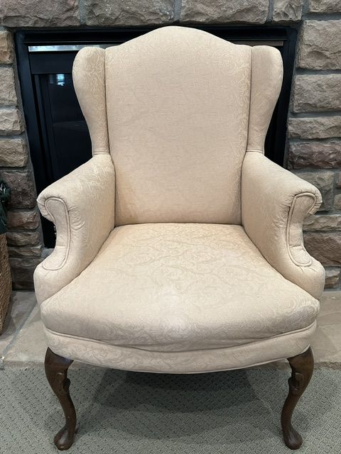 Chair....upholstered wingback chair with cabriolet legs