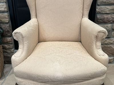Chair....upholstered wingback chair with cabriolet legs