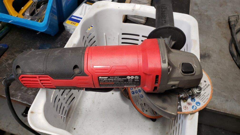 4 1/2" angle grinder with discs.