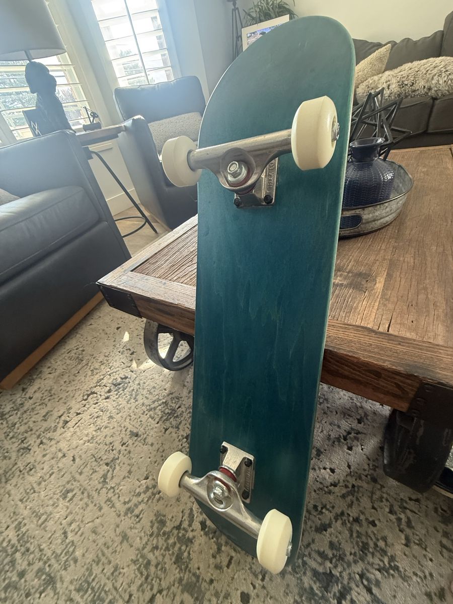 Complete Skateboard Teal Stained Deck with Independent Trucks & White Wheels