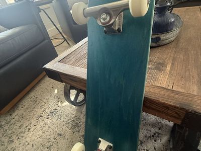 Complete Skateboard Teal Stained Deck with Independent Trucks & White Wheels