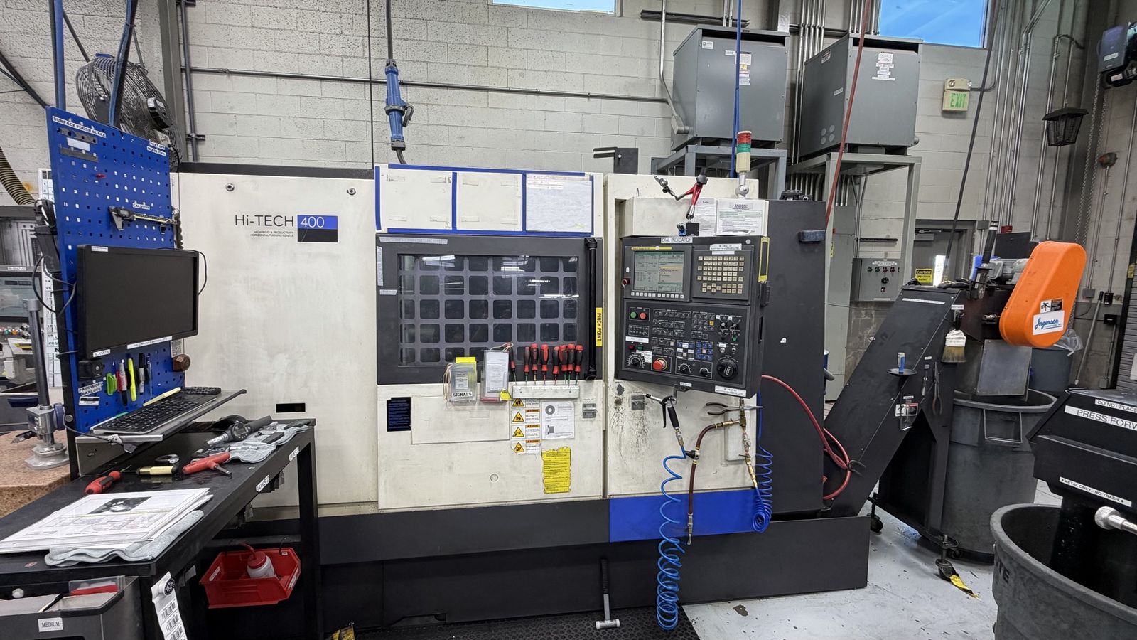 2012 Hwacheon Hi-Tech 400 turning center with a 12 station turret
