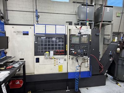 2012 Hwacheon Hi-Tech 400 turning center with a 12 station turret